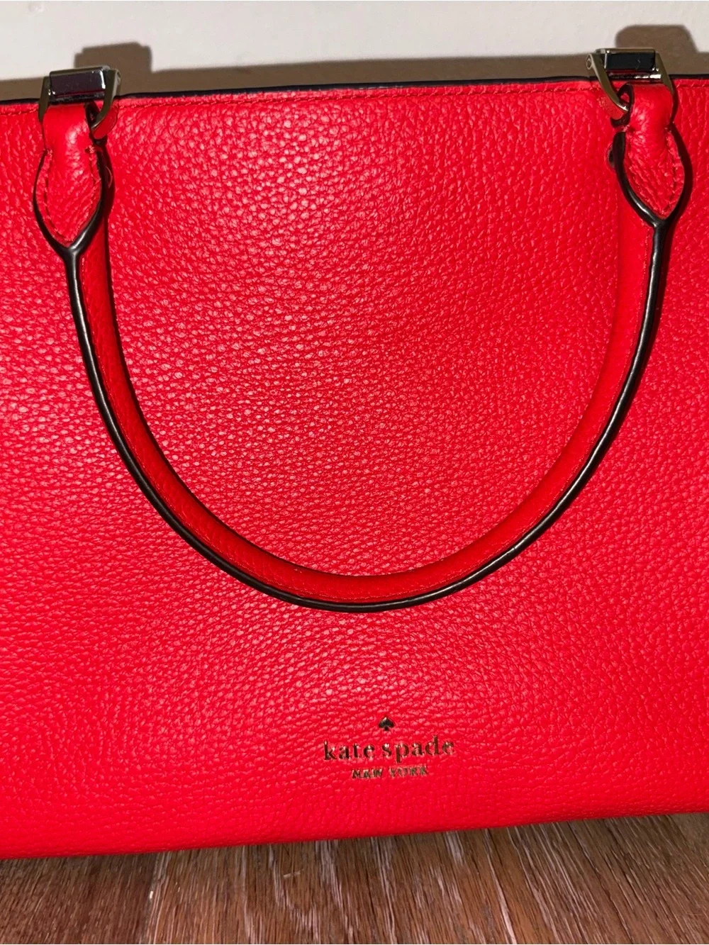 kate spade red pebbled leather satchel with polished hardware